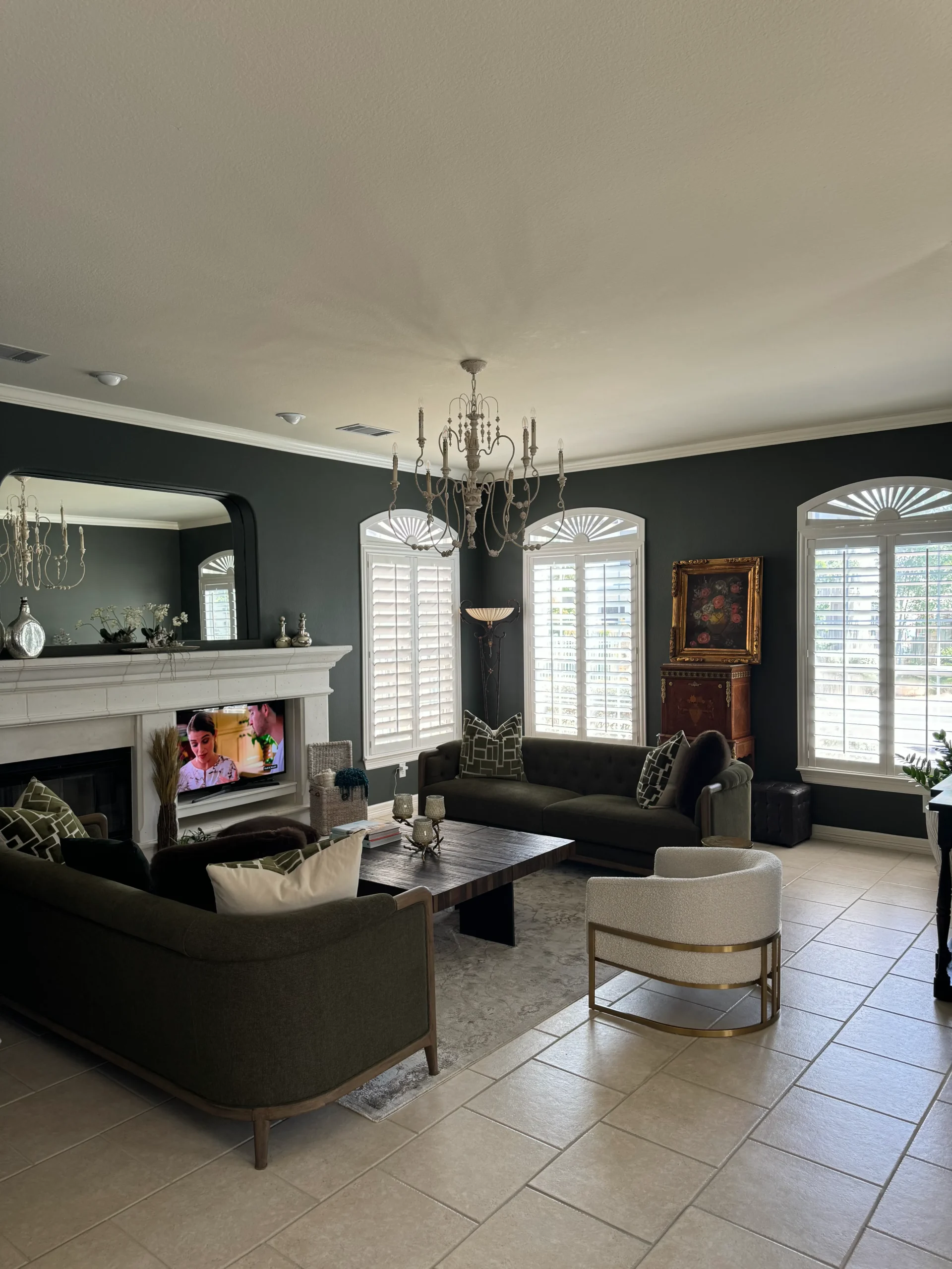 a living room with dark, painted walls