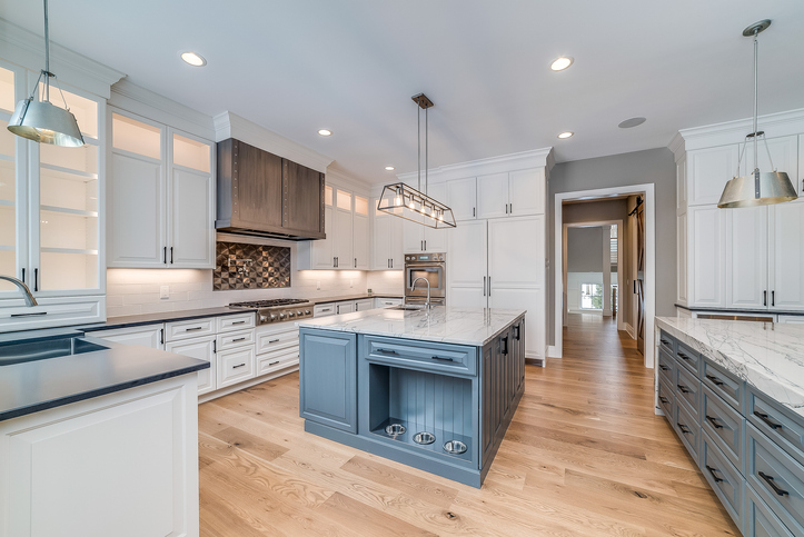 A kitchen painted blue and white interior colors