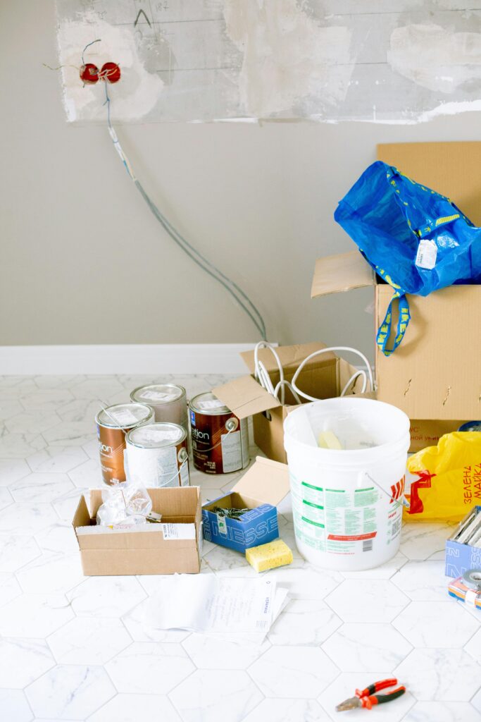 A collection of paint supplies put together for an upcoming painting project