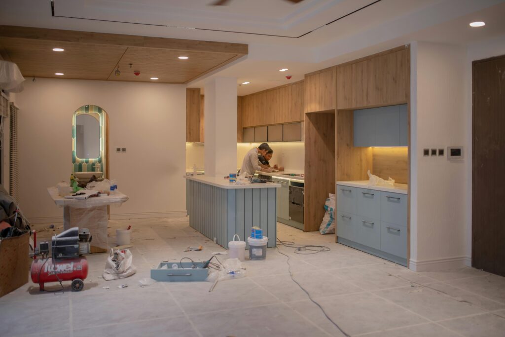 A kitchen about to be painted is being prepped ahead of time. 